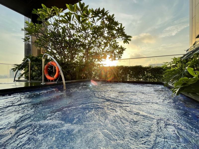 Sunset by the rooftop jacuzzi heated pool at The Clan Hotel