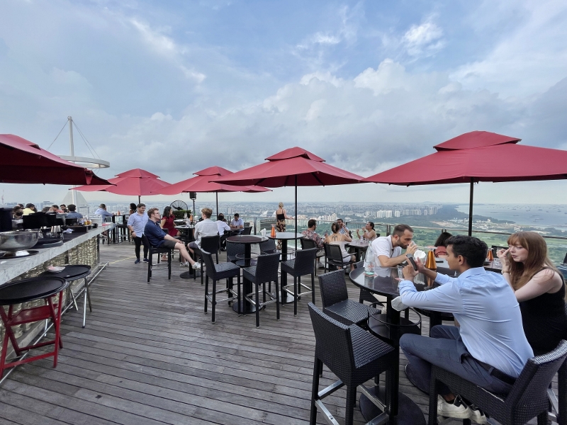 Outdoor seating area at CÉ LA VI Restaurant & SkyBar at Marina Bay Sands Hotel