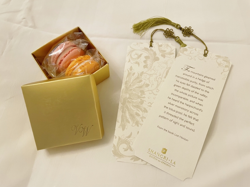 A box of two macarons and two bookmarks from Valley Wing Deluxe Room at Shangri-La Hotel
