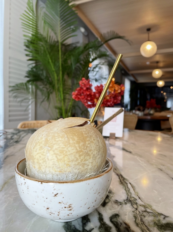 Fresh coconut juice drink from Po restaurant at The Warehouse Hotel