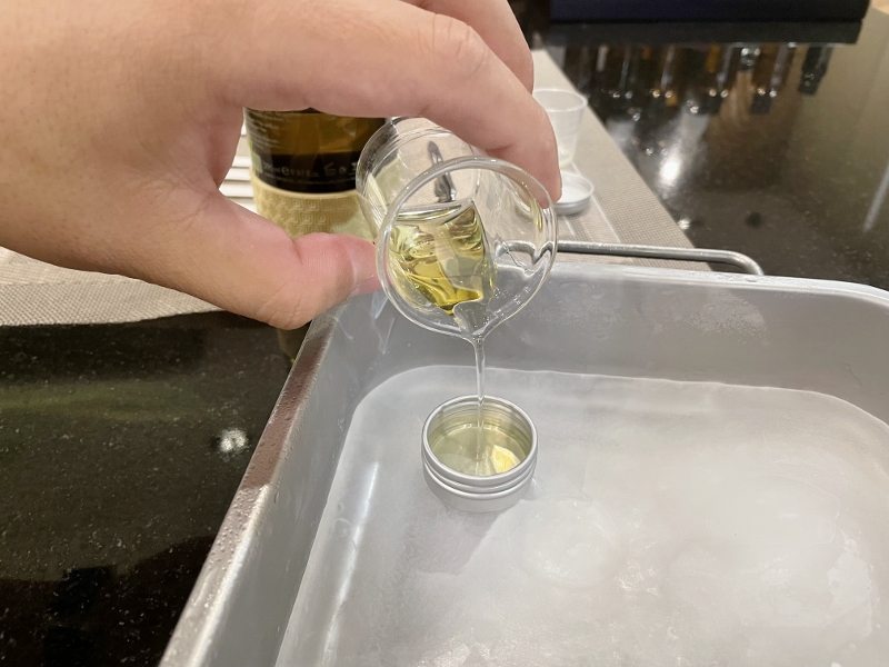 Pouring the balm mix into the container at THANN Wellness Store at Paragon Mall