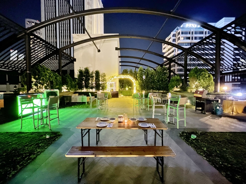 Outdoor seating area at Sky Garden bar and grill restaurant at Grand Park City Hall Hotel