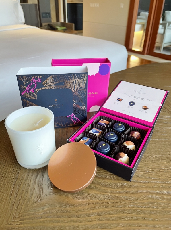 Chocolate and candle amenities in Premier Garden Room at Capella Hotel