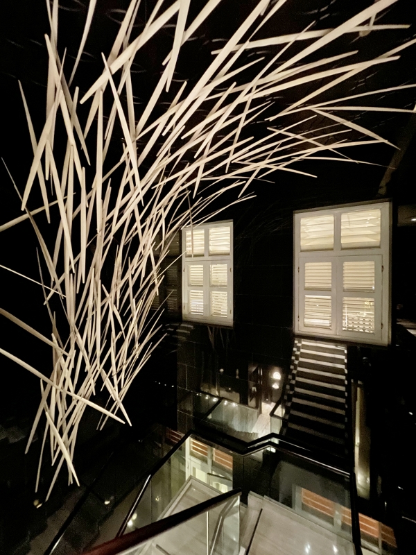 Bamboo fixture above the walkway to Cassia restaurant at Capella Hotel
