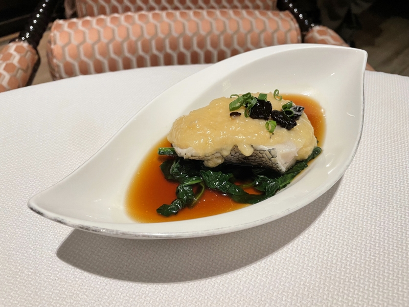 Steamed cod fish with black garlic and light soya sauce from Cassia restaurant at Capella Hotel