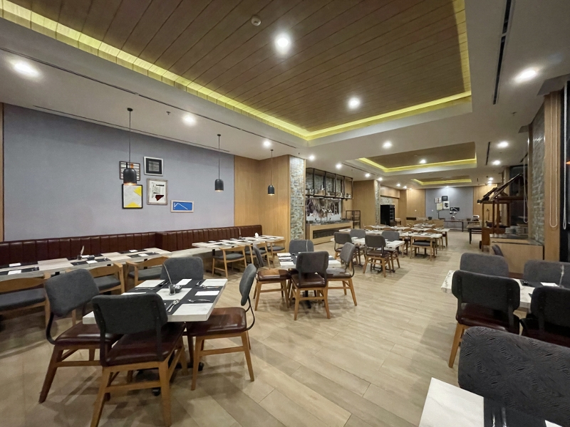 Seating area at Evolution restaurant at Four Points Hotel By Sheraton Batam