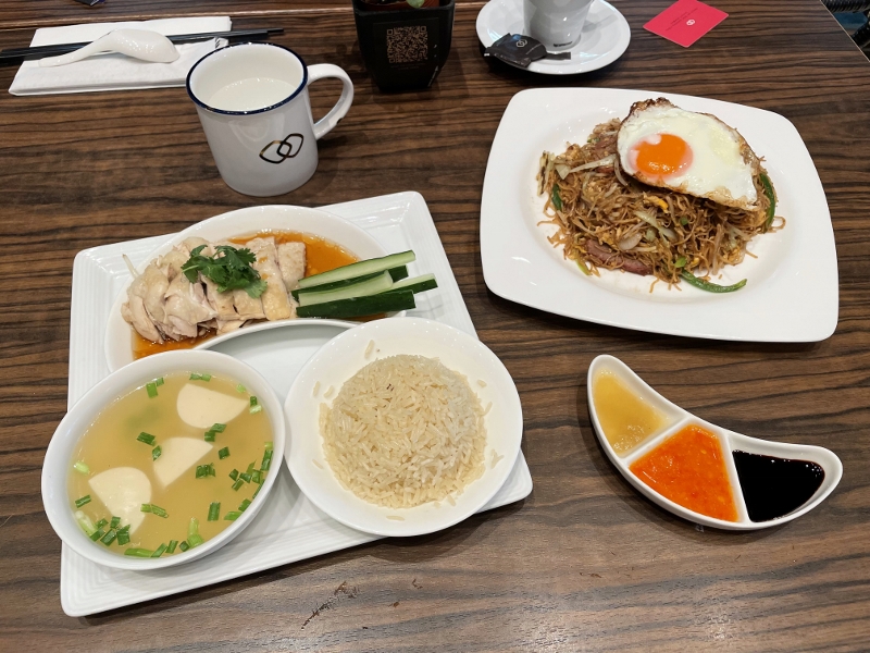 Hainanese chicken rice, wok-fried noodles with BBQ pork and a flat white from Kwee Zeen restaurant at Sofitel Singapore Sentosa Resort & Spa