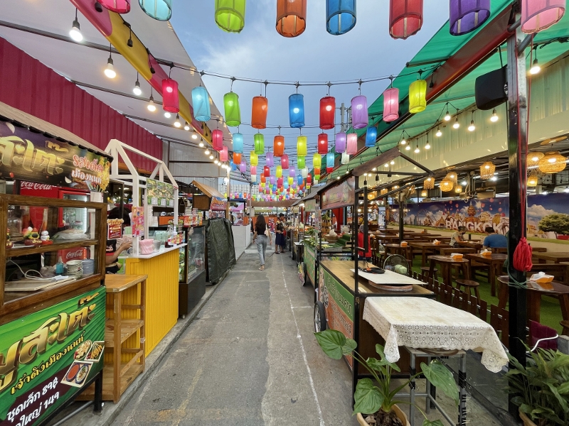 Walkway decorated with hanging lanterns at Liab Duan Night Market