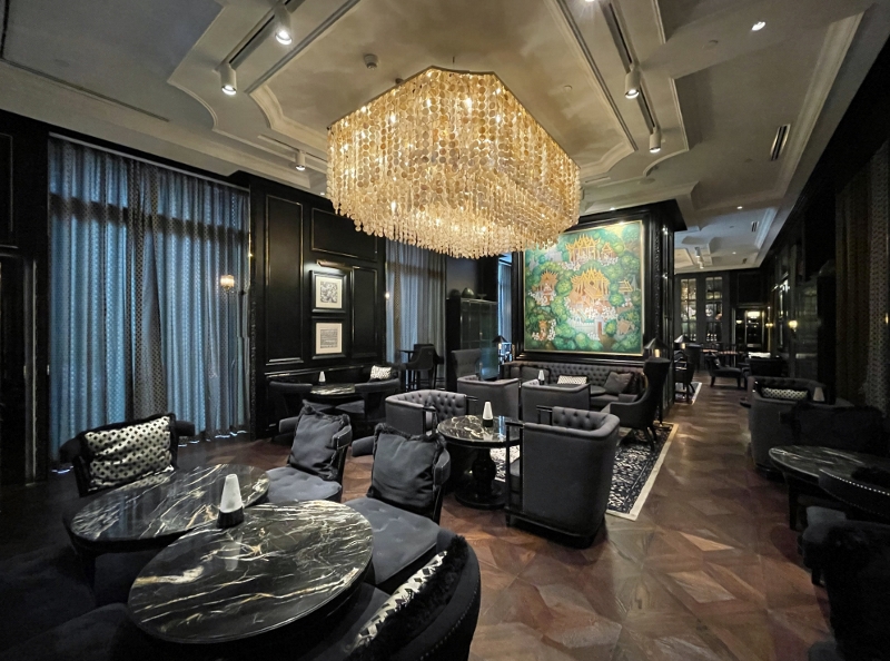 Seating area at Firefly Bar at Sindhorn Kempinski Hotel