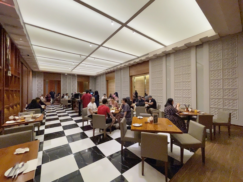 Seating area at Makan Kitchen restaurant at DoubleTree By Hilton Hotel