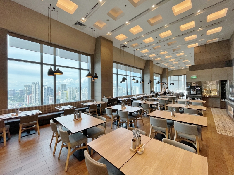 Seating area at Sky22 restaurant at Courtyard By Marriott Hotel Novena
