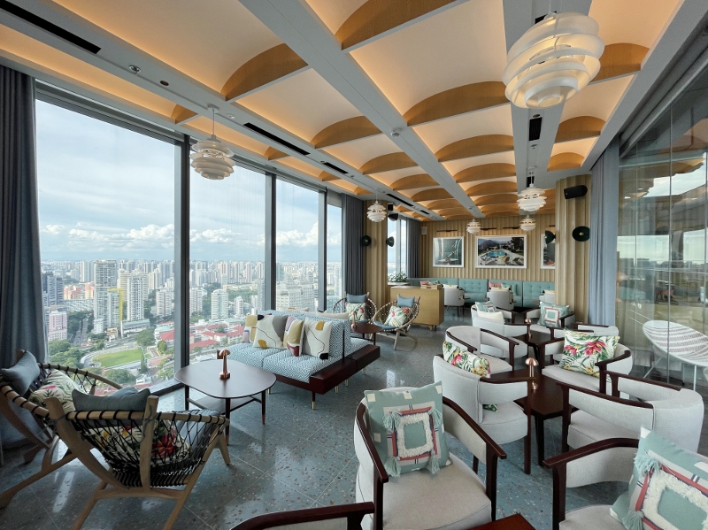 Seating area at Las Palmas rooftop bar at Courtyard By Marriott Hotel Novena