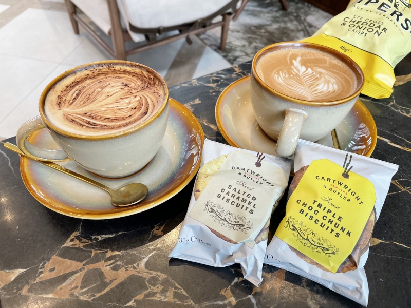 A mocha, a cappuccino and Cartwright & Butler cookies from The Living Room at The Barracks Hotel
