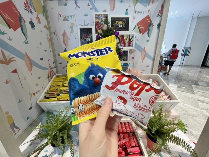 Local snacks from a cart at Village Hotel Sentosa reception area
