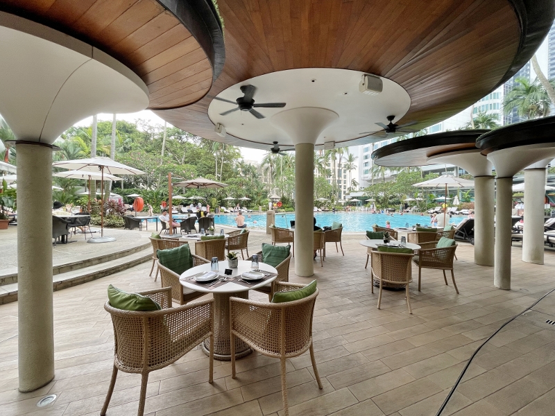 Outdoor seating area at Waterfall Ristorante Italiano restaurant at Shangri-La Hotel