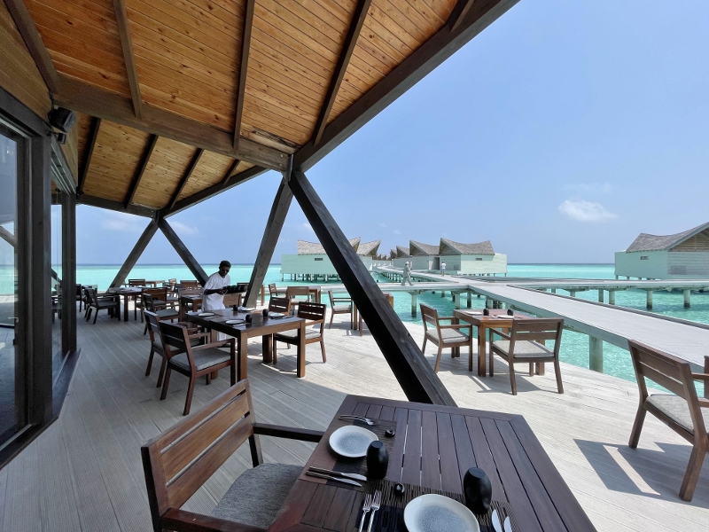 Outdoor seating area at Bodumas restaurant at Mövenpick Resort Kuredhivaru