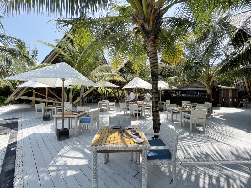 Seating area at Latitude 5.5 restaurant and bar at Mövenpick Resort Kuredhivaru
