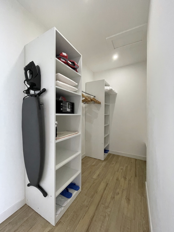 Closet area in Overwater Pool Villa Ocean at Mövenpick Resort Kuredhivaru