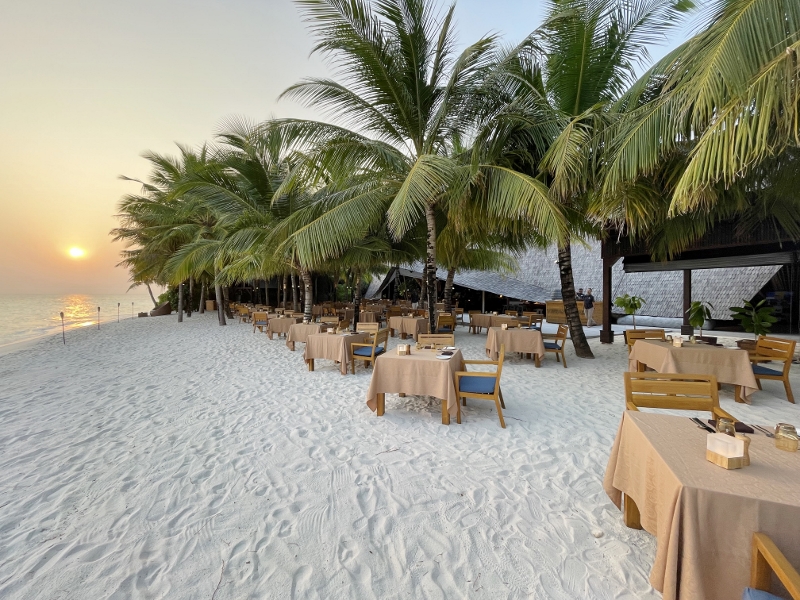 Beachfront seating area at ONU Marche restaurant and bar at Mövenpick Resort Kuredhivaru