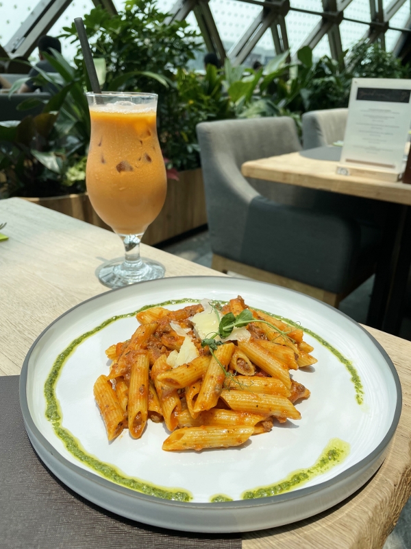 Penne with bolognese and thai milk tea from Greenhouse restaurant at Dusit Thani Laguna Hotel