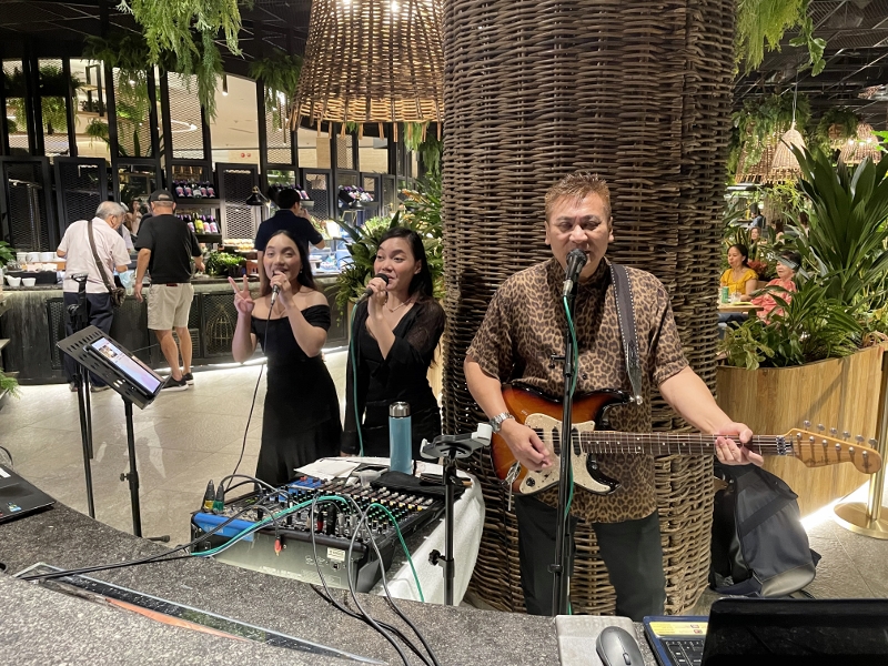 Resident live band performing at Legends Bar at Dusit Thani Laguna Hotel