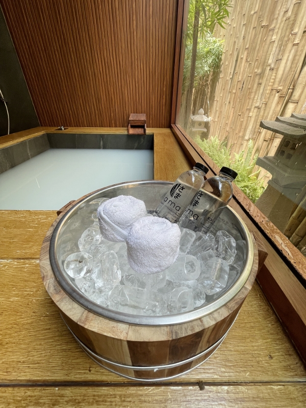 Bottled water and small towels in ice at SAMA Onsen & Massage Spa