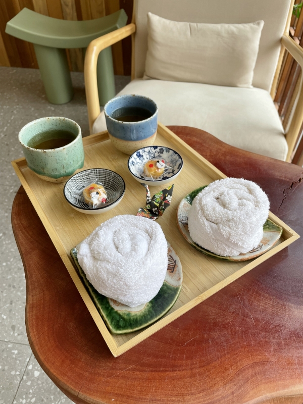 Tea, snacks and towels from SAMA Onsen & Massage Spa