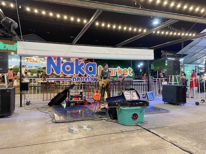 A live musician at Naka Weekend Market