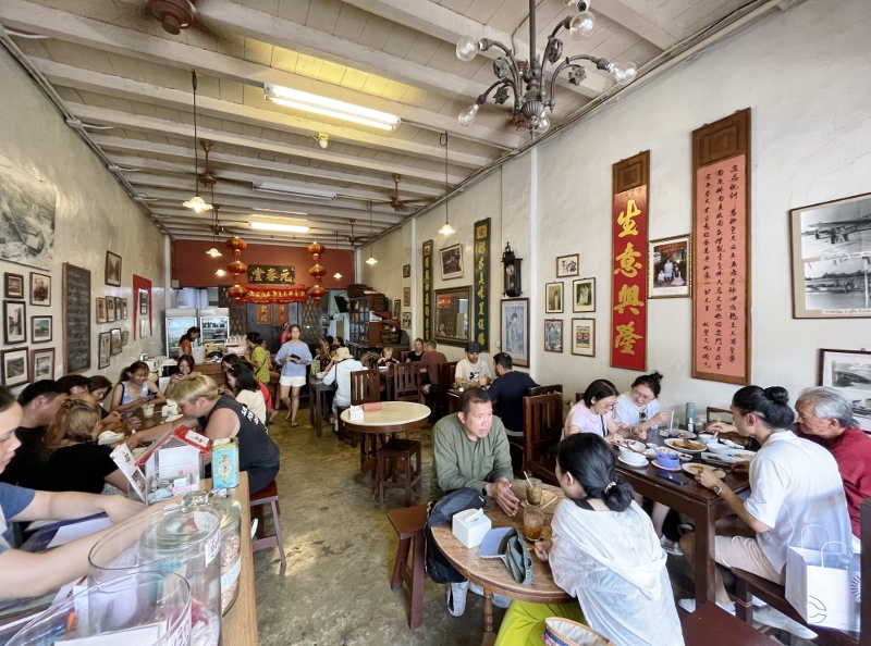 Seating area at Kopitiam By Wilai Cafe