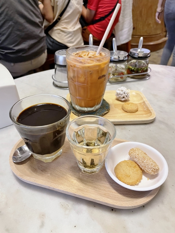 Hot Thai milk coffee with condensed milk and iced Thai milk tea with condensed milk at Kopitiam By Wilai Cafe