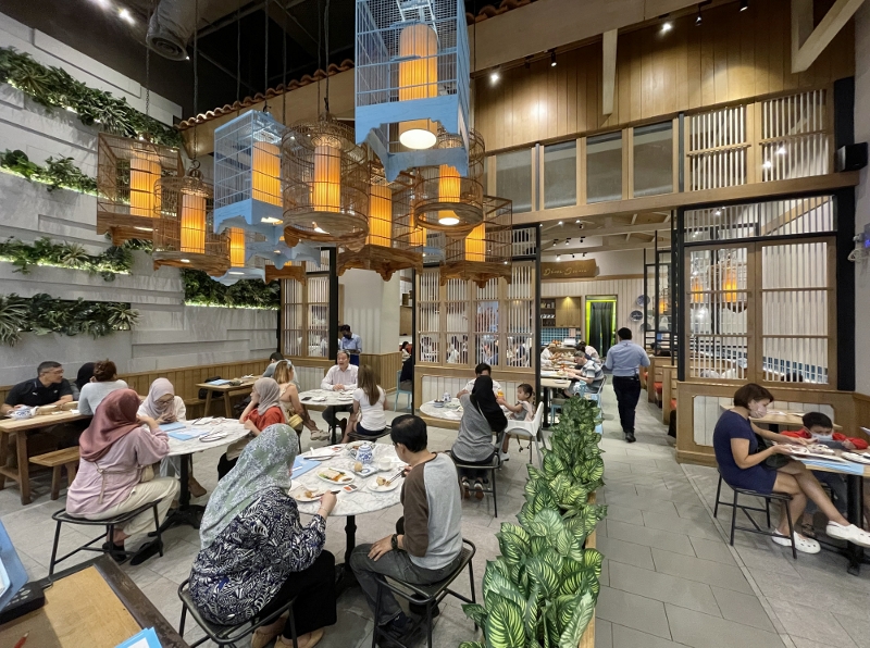 Seating area at Dolly Dim Sum restaurant at NU Sentral shopping mall