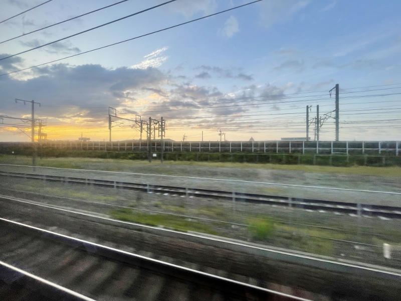The view of the sunrise from the room aboard Sunrise Express sleeper train
