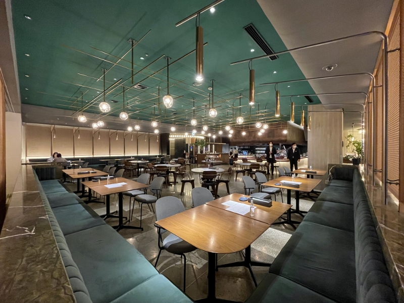 Seating area at ERUTAN restaurant and bar at Good Nature Hotel Kyoto