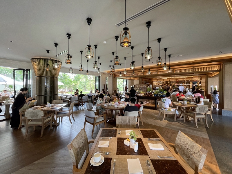 Seating area at Karang restaurant at AYANA Segara Bali Hotel