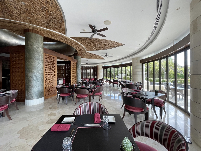 Seating area at DAVA Steak & Seafood restaurant at AYANA Villas Bali