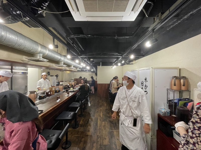 Seating area at Gyukatsu Motomura restaurant at Namba 3-Chome-3-1