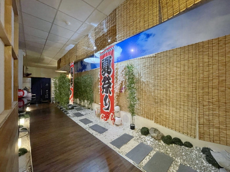 Walkway leading to the public onsen entrance at Joya Onsen Cafe