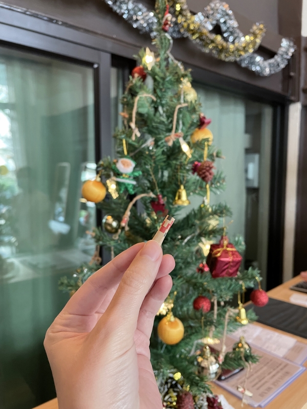 Christmas lucky draw scroll at Luna Massage & Head Spa