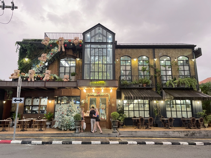 Day & Night Of Phuket Cafe building facade