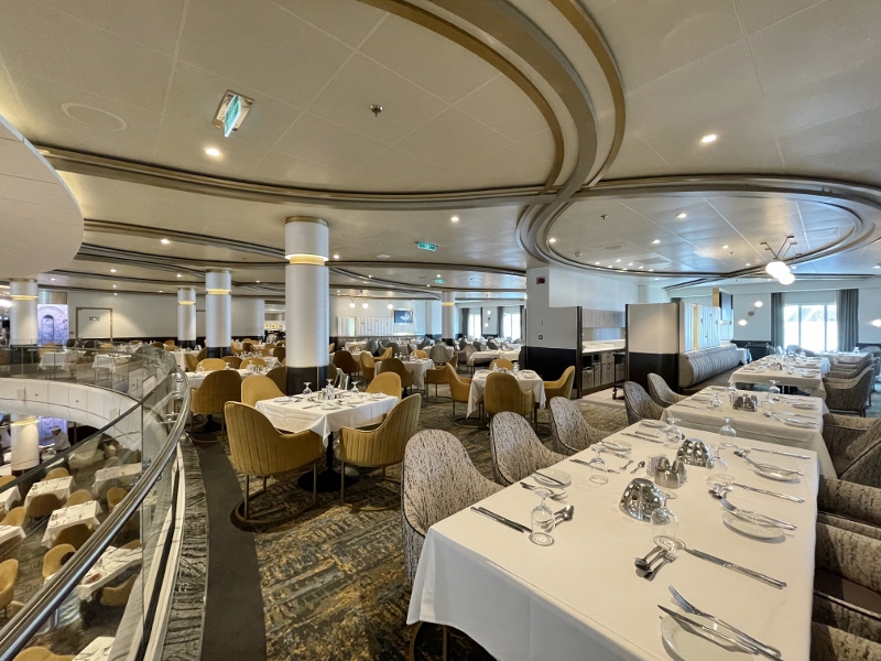 Seating area at Main Dining Room restaurant on Royal Caribbean Spectrum Of The Seas