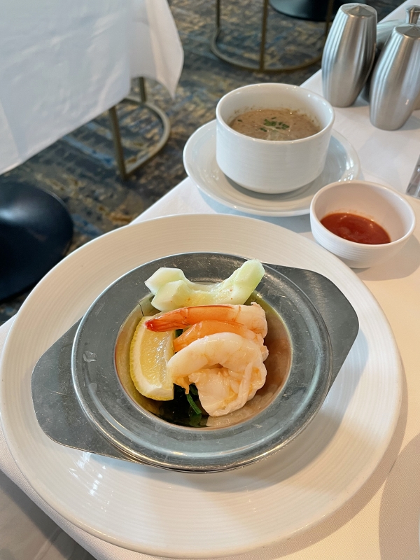 Colossal shrimp cocktail and wild mushroom soup from Main Dining Room restaurant on Royal Caribbean Spectrum Of The Seas