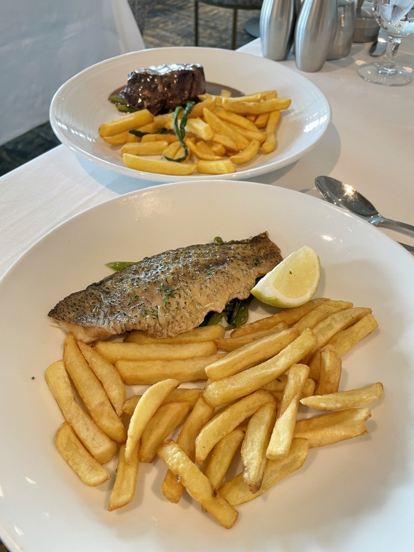 6 oz angus filet mignon and grilled branzino from Main Dining Room restaurant on Royal Caribbean Spectrum Of The Seas
