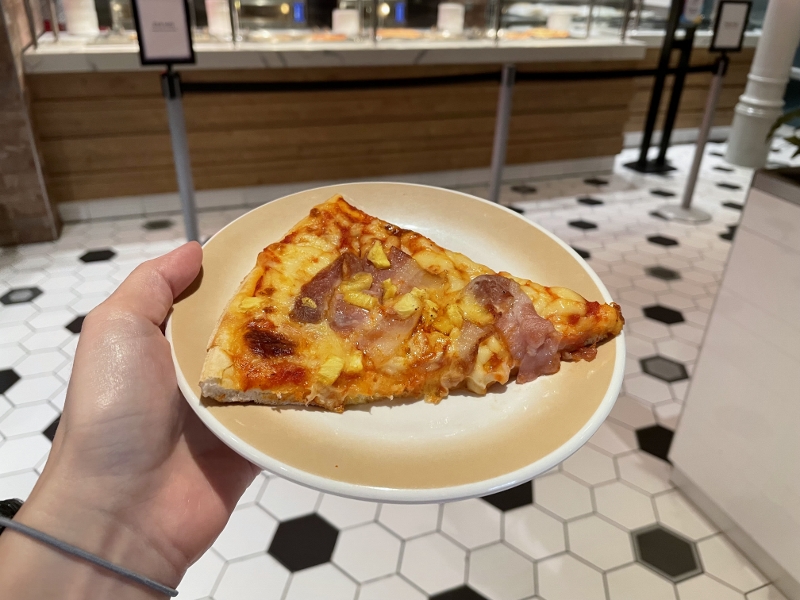 A slice of pizza from Sorrento's Pizza on Royal Caribbean Spectrum Of The Seas