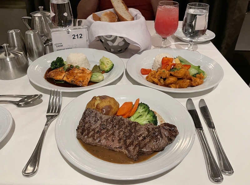 New York strip steak, Cantonese-style sweet and sour pork and salmon teriyaki from Main Dining Room restaurant on Royal Caribbean Spectrum Of The Seas
