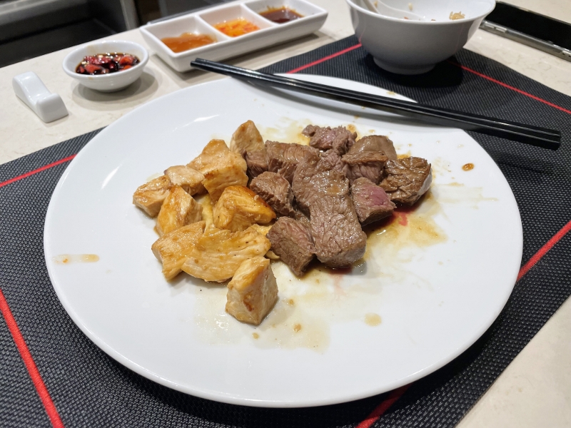 Chicken breast and beef from Izumi Teppanyaki restaurant on Royal Caribbean Spectrum Of The Seas