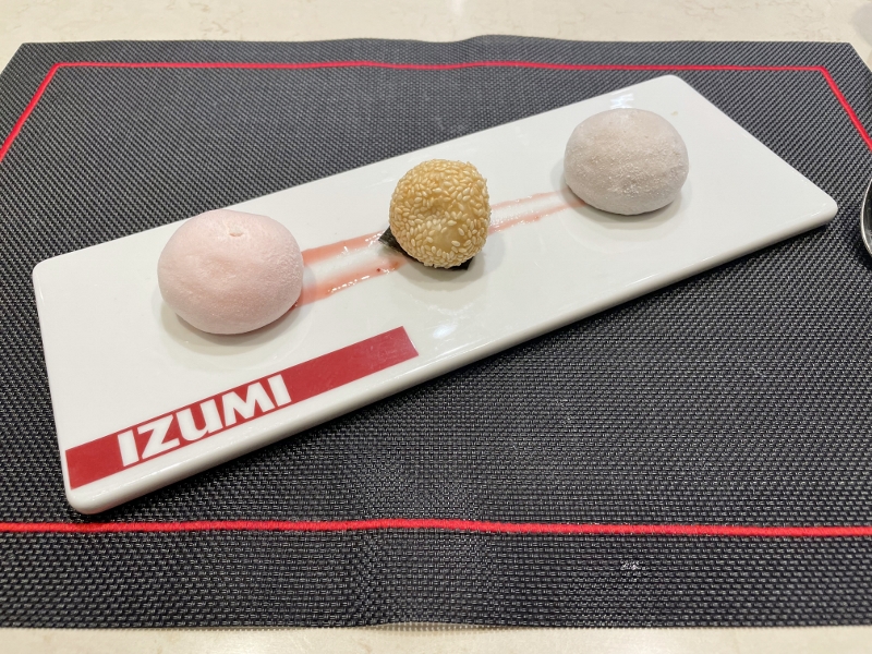 Crispy sesame ball and assorted mochi ice cream from Izumi Teppanyaki restaurant on Royal Caribbean Spectrum Of The Seas