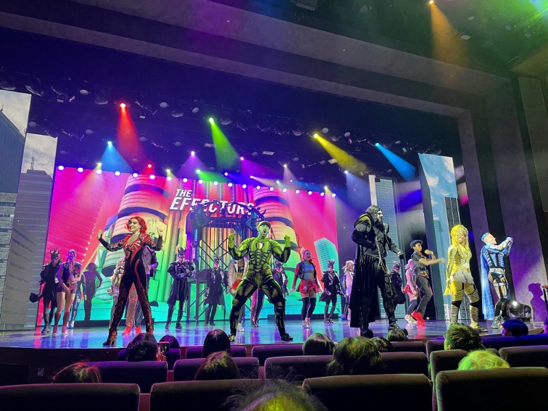 Performers on stage during The Effectors performance at Royal Theatre on Royal Caribbean Spectrum Of The Seas
